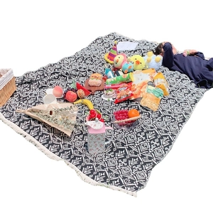 Bohemian black and white geometric woven picnic mat with tassels for outdoor camping