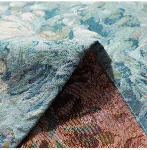 Detailed close-up showing the premium jacquard weave and floral pattern on a thick tablecloth
