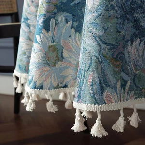 Floral jacquard table runner in vintage blue with white tassels for dining decor