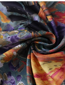 Macro shot of waterproof oil painting tablecloth showing smooth satin texture and artistic abstract print