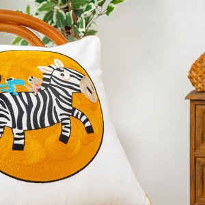 Square throw pillow with zebra towel embroidery on yellow circle background for sofa decor