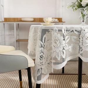 Minimalist white lace tablecloth with floral crochet pattern for elegant home decor