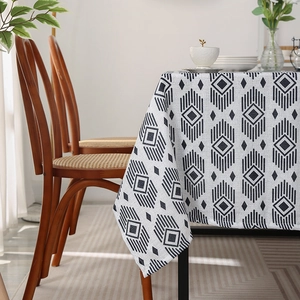 Modern minimalist oil-proof tablecloth with blue geometric patterns on beige fabric