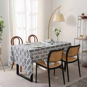 Modern minimalist white tablecloth with black geometric diamond patterns for home dining tables