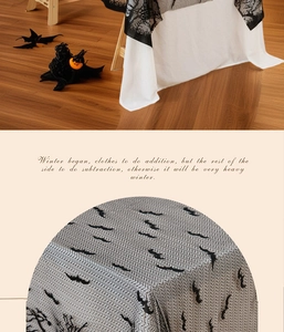 Detailed close-up showing the intricate black lace bat and forest patterns on a white tablecloth