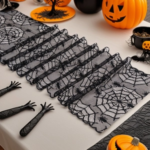 Elegant black lace Halloween table runner featuring intricate spider web and spider designs