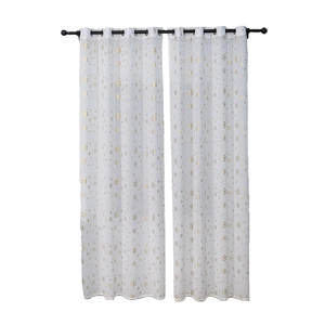 Set of two white blackout curtains with gold foil star patterns and metal grommet top