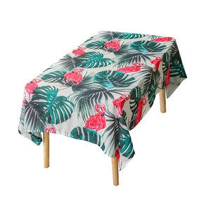 Minimalist linen tablecloth with tropical flamingo and monstera leaf print on light grey