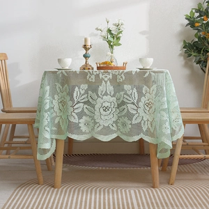 Elegant light green lace tablecloth with rose floral pattern and wavy edges for home decor