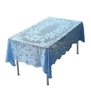 Elegant light blue knitted lace tablecloth with hollow floral pattern and wavy edges