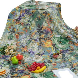 Vibrant oil painting floral picnic mat used as an artistic tablecloth for outdoor dining