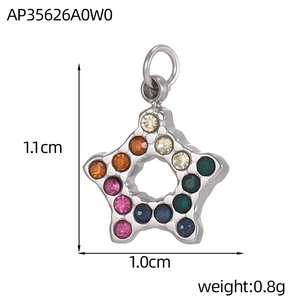 Detailed macro of a star pendant with multi-colored crystals and a polished silver finish