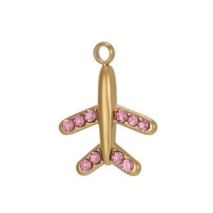 Detail of gold aircraft pendant with pink rhinestones for DIY jewelry making
