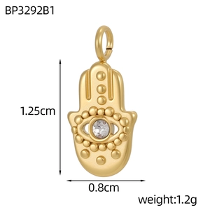 Colgante mano de fátima dorado con circón incluyendo tamaño 1.25cm y detalles de peso