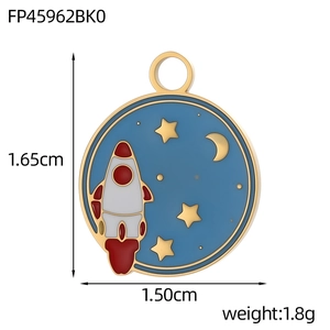 Detailed view of round enamel space pendant with rocket and stars measuring 1.65cm
