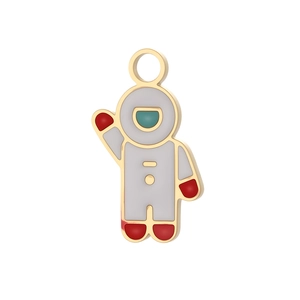 Detail of a golden astronaut pendant with white and blue enamel for DIY jewelry making
