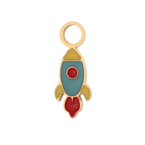 Detailed macro view of an enamel rocket charm with gold finish for DIY jewelry making