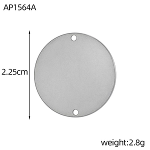 Detailed view of 2.25cm round stainless steel blank tag with dual holes for jewelry making