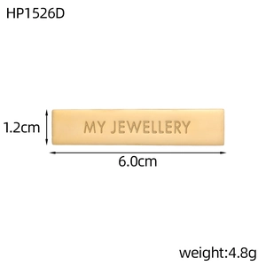 Detail view of a 6cm gold rectangular stainless steel pendant with MY JEWELLERY engraving