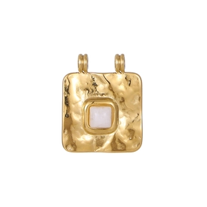 Detailed macro view of a gold square pendant with hammered texture and white square gemstone