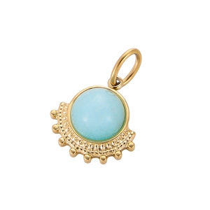 Detailed macro view of fan-shaped gold titanium pendant with light blue gemstone