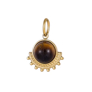 Macro detail of fan-shaped titanium pendant with natural stone inlay and gold texture