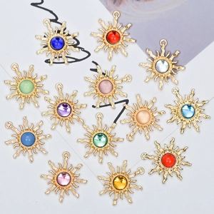 Baroque sun pendant with natural stones in polished gold metal for DIY jewelry