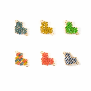 Macro shot of heart shaped zircon jewelry connectors in six colors for DIY necklace making