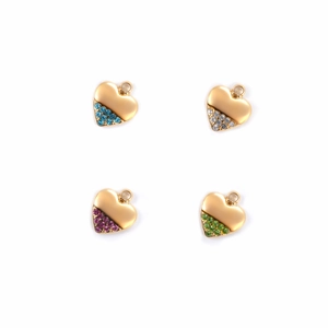 Macro detail of heart-shaped gold pendants with colorful pavé rhinestones in 4 colors