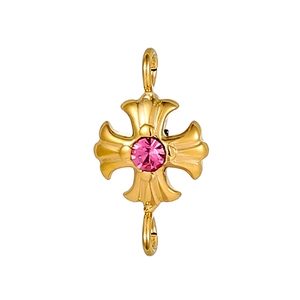 Dettaglio del connettore a croce dorata con zircone rosa per creazione gioielli fai da te