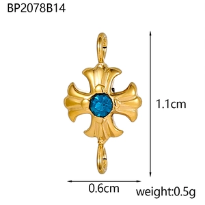 Dettaglio connettore croce dorata con zircone blu e misure per creazione gioielli