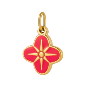 Gros plan d'un pendentif fleur en émail rouge et doré pour la création de bijoux DIY