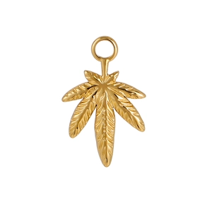 Detailed close-up of a gold hemp leaf shaped metal pendant with polished jagged edges