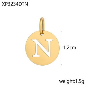 Detail of round hollow 14K gold-plated letter N pendant with 1.2cm size and 1.5g weight