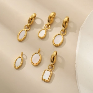 Golden lobster clasp shell charms in oval and teardrop shapes for DIY jewelry