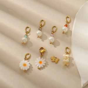 Handmade freshwater pearl and daisy charms set for earrings with gold-plated lobster clasps