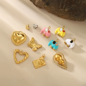 DIY jewelry charms set featuring colorful elephant butterfly and heart pendants in gold finish