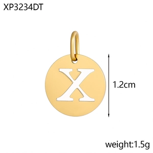 Macro view of a 1.2cm round gold-plated stainless steel letter X charm pendant