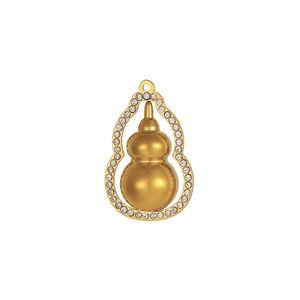Detailed close-up of a gold gourd-shaped jewelry pendant featuring sparkling rhinestones