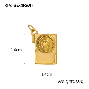 Macro shot of gold vintage camera pendant with 1.6cm height and 1.4cm width dimensions