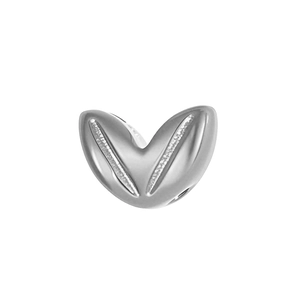 Detailed macro view of silver V-shaped metal charm with double rows of white zircon stones