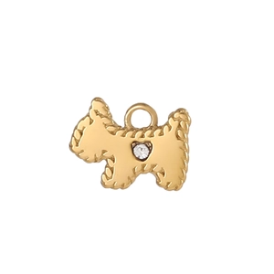 Detailed close-up of a golden Scottish Terrier pendant with white zircon accent