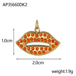 Detailed view of red lip charm with orange rhinestones and gold finish measurements