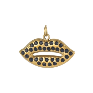 Detailed macro view of a gold-plated lip-shaped charm with micro-set black crystals