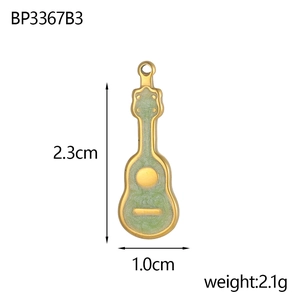 Guitar-shaped pendant with gold edges and green glitter, dimensions 2.3cm by 1.0cm