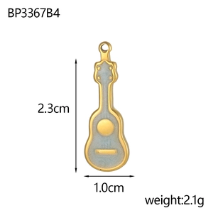 Macro detail of gold guitar pendant with blue enamel, size 2.3x1.0cm and 2.1g weight