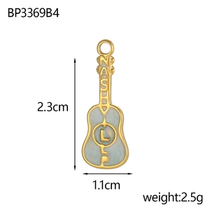 Detailed view of a gold guitar pendant with blue enamel, size 2.3cm x 1.1cm and 2.5g weight