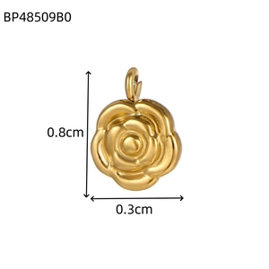 Detail view of a 0.8cm golden camellia pendant with a matte stainless steel finish