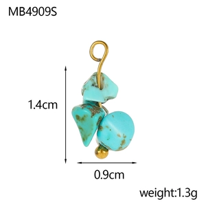 Detail of blue turquoise stone pendant with gold loop measuring 1.4cm high and 0.9cm wide