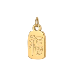 Macro view of a gold square pendant with Chinese Fu character for luck and fortune
